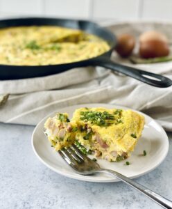spring frittata made with white beans and leftover ham