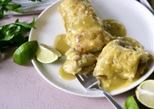 these great northern bean and chicken enchiladas are a simple, delicious, and inexpensive weeknight meal.